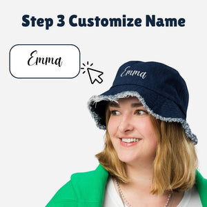 Denim bucket hat with a distressed brim, personalized with custom name embroidery.