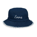 Denim bucket hat with a distressed brim, personalized with custom name embroidery.